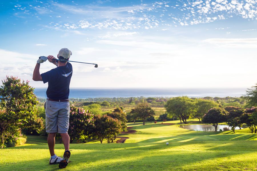 Golf Course Insurance - Man Hitting the Greens in the Sunshine